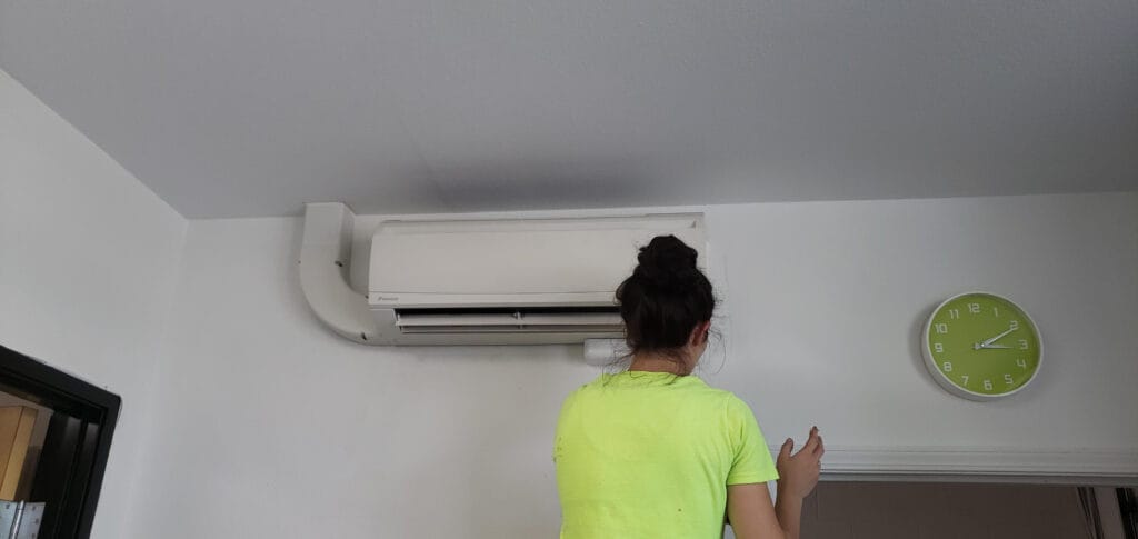 AC Unit and woman