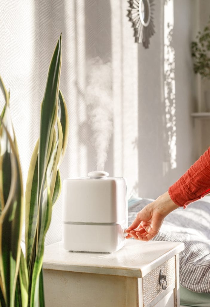 A photo of a humidifier in an apartment being turned off or on
